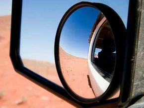 Convex hot spot mirrors are the simplest to attach to your existing side mirrors.