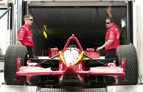 race car loading onto a trailer