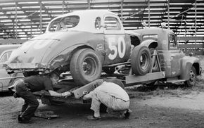 race car and trailer in the 1950s