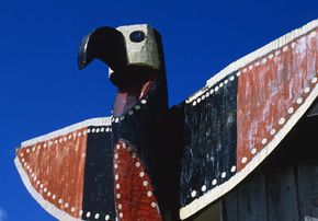 totem pole carved like a bird