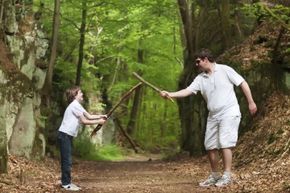 boy and dad play