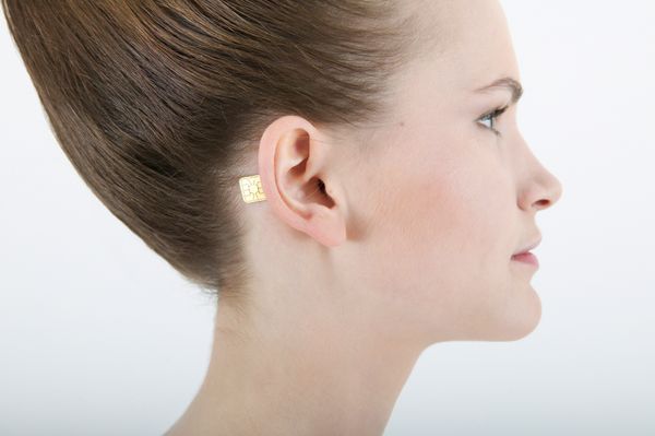 woman with chip behind her ear