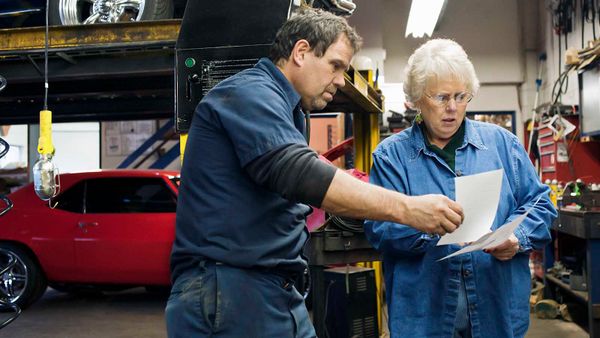 woman at auto mechanic