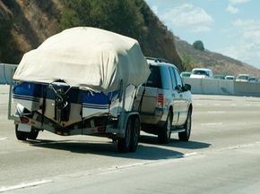 Close-up view of truck towing a boat.