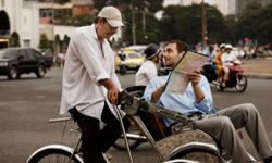 Tourist on bike giving directions. 