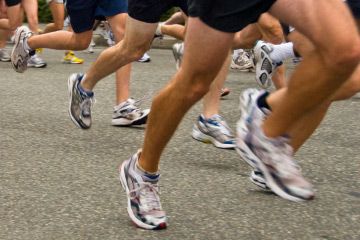 Athlete running in sporty shoes while exercising.