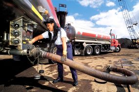 trucker fueling truck