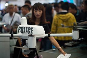 A drone used by the police is displayed at the 2014 China International Industry Fair in Shanghai in 2014. Drones are used in all kinds of industries.