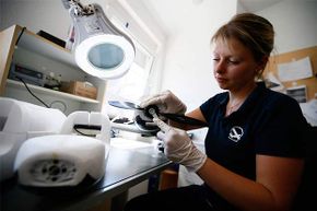 An employee of MAVinci assembles a camera-quipped Sirius UAV in Germany. Hundreds of projects in Europe are underway to develop civilian UAVs.