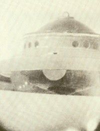 While Otis Carr was working on his spaceship, George Adamski photographed this Venusian &quot;scoutship&quot; -- in actuality a small model patterned after a craft proposed by space-travel theorist Mason Rose -- at his Palomar Garden, California, home on December 13, 1952.