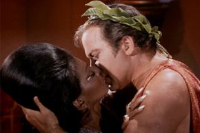 Nichelle Nichols as Lieutenant Uhura and William Shatner as Captain James T. Kirk in the "Star Trek" episode "Plato's Stepchildren."”border=