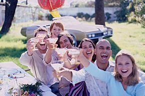 Happy people, wine and car