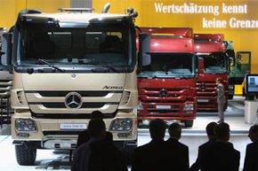 Image Gallery: Trucks Visitors stop to examine Mercedes-Benz heavy trucks at the Daimler stand during a media and industry professionals' day at the IAA Commercial Vehicles trade fair on Sept. 24, 2008 in Hanover, Germany. See more pictures of trucks.