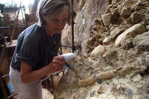 French paleontologist Marie-Antoinette De Lumley works at the archaeological prehistoric site of Caune de l'Arago in Tautavel, France. Paleoscatlogists are paleontologists who specialize in the world of fossilized poop.