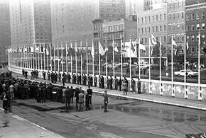 Raising 16 new member flags at U.N. Headquarters in 1960