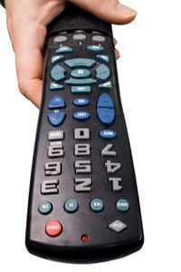hand holding remote