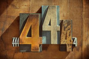 Multiple sizes of letterpress number fours