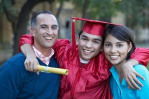 Parents with new college graduate. 