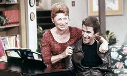 Actors Henry Winkler, as Arthur &quot;Fonzie&quot; Fonzarelli, and Marion Ross as Marion Cunningham, in a scene from &quot;Happy Days,&quot; circa 1975.