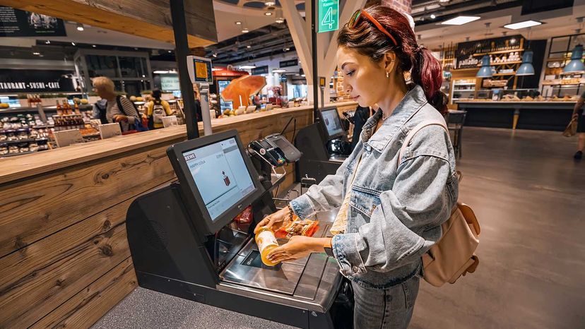 Woman encountering a UPC at the grocery store.