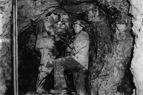 July 1, 1947: Miners search for uranium in the mountains north of Adelaide, Australia.