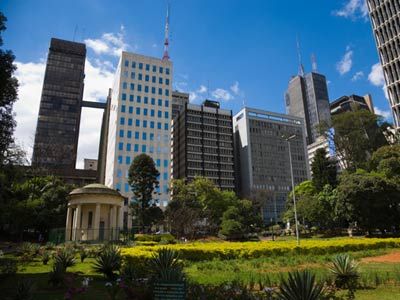 Alexandre Gusmao Square and other office buildings, with city park in foreground.