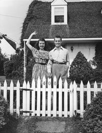 Real Estate Pictures A young couple stands proudly by their piece of the American dream in 1947. See more real estate pictures.