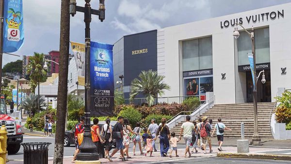 City life of famous place, retail, architecture, and sign.