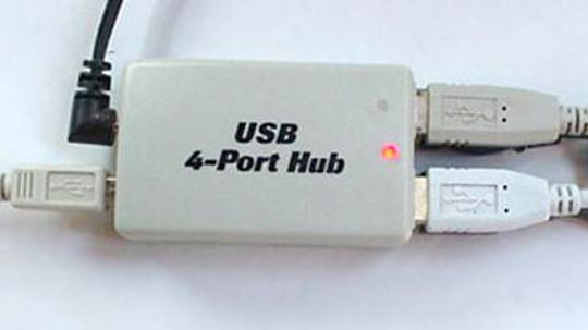 How do I add a USB device to my computer if I am out of ports?