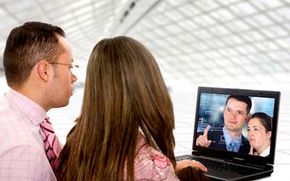 Video conferencing lets associates communicate from different locations.