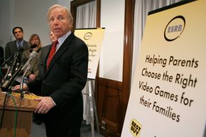 Sen. Lieberman speaks during a news conference with the Entertainment Software Rating Board (ESRB). 