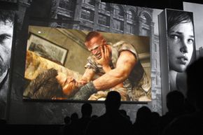 Men fight to the death in the violent PlayStation 3 game, The Last of Us, at a Sony press conference on the eve of the Electronic Entertainment Expo (E3) in Los Angeles in 2012.