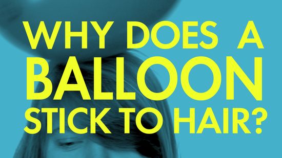 Why does a balloon stick to hair?