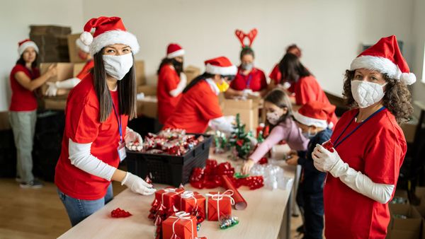 vounteers packing food parcels