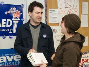 Actor Ron Livingston drums up support for Barack Obama in 2008, one volunteer helping to promote other volunteers in support of a cause.