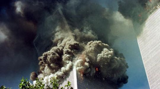 What caused the World Trade Center towers to collapse on 9/11?