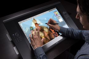 artist drawing on and touching Cintiq 24 HD touch graphics tablet