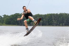 Men speedily performing extreme sports.