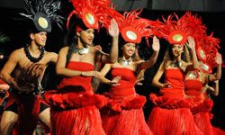 The pre-marathon luau features traditional dancing in Waikiki.