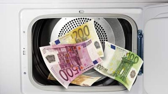 Why doesn't paper money disintegrate when it gets washed in the washing machine?