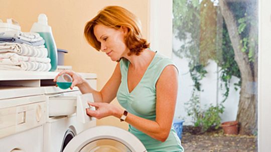 How do washing machines get clothes clean?