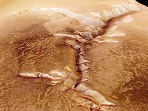 Geographical features such as the Echus Chasam have captured the imaginations of scientists and dreamers for decades. Did Martian water etch these valleys in the planet's surface? See more Mars pictures.