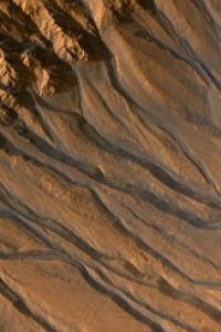 The Mars Reconnaissance Orbiter's High Resolution Imaging Science Experiment (HiRISE) camera took captured images of gully channels on Mars.