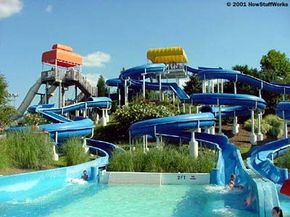 In this serpentine water slide, the sharpest curves are completely enclosed, so riders won't go flying off into space.