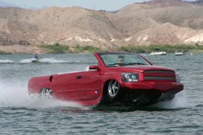 Image Gallery: Concept Cars The WaterCar Python is capable of more than 60 miles per hour (52 knots) on the water, and a top speed of more than 125 miles per hour (201.2 kilometers per hour) on land. See pictures of concept cars.