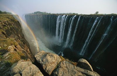 A view of water rushing over Victoria Falls.