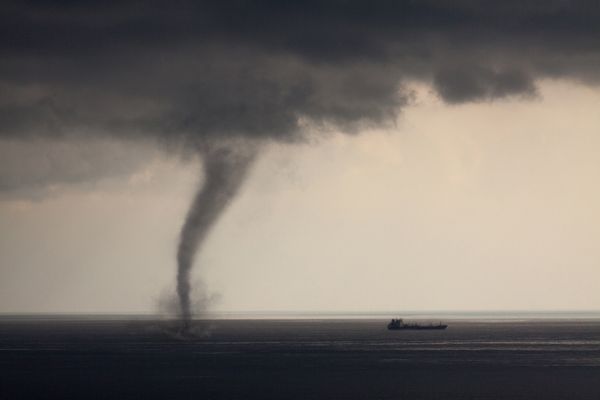 Waterspout tornado over the ocean