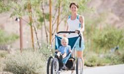 Mother pushing baby in stroller