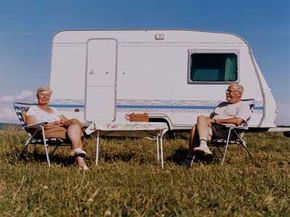 couple in front of trailer