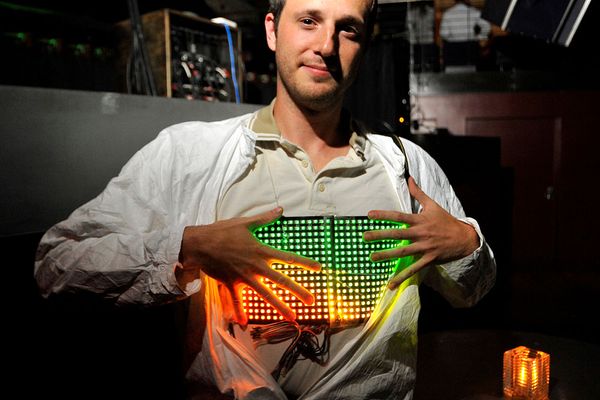 Erik Johnson shows off an outfit that is part of "project light bright" at the Glazed Conference in San Francisco in September 2013.